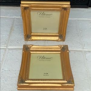 A set of 5x5 gold picture frames